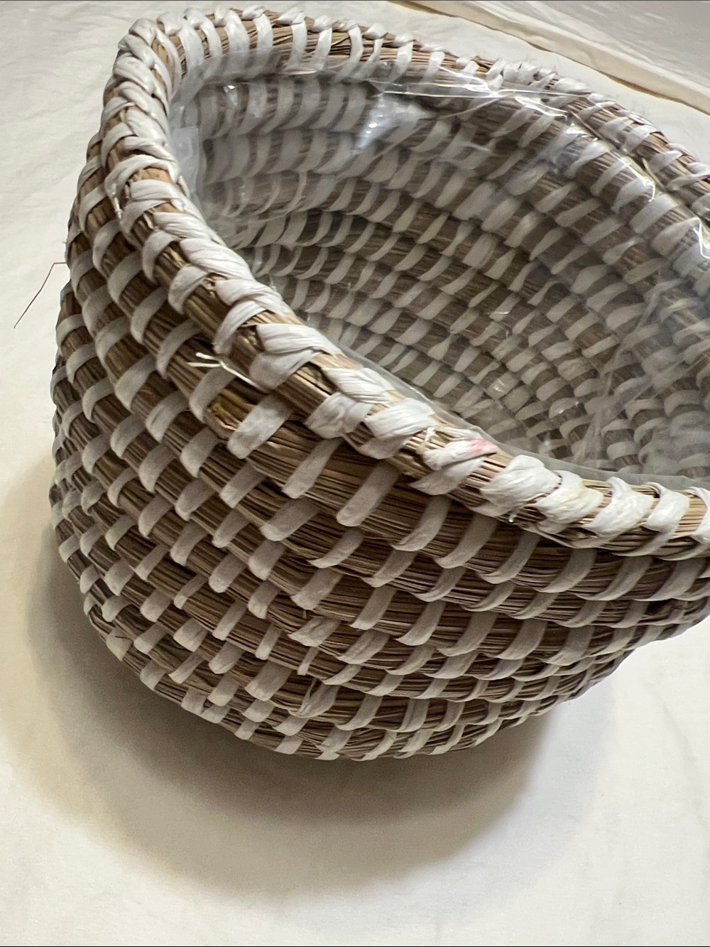 Handwoven Natural and White Round Storage Basket